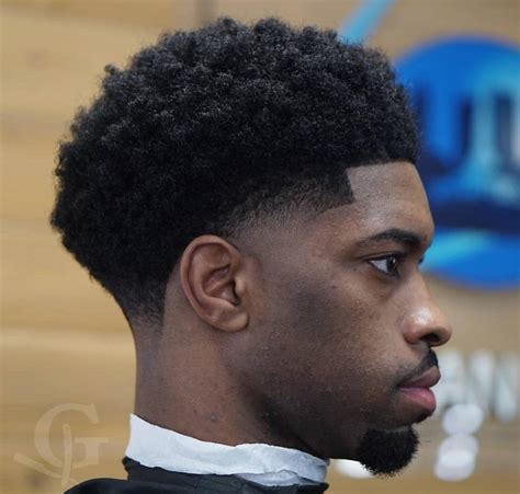 skin taper fade black male|taper haircut for black male.